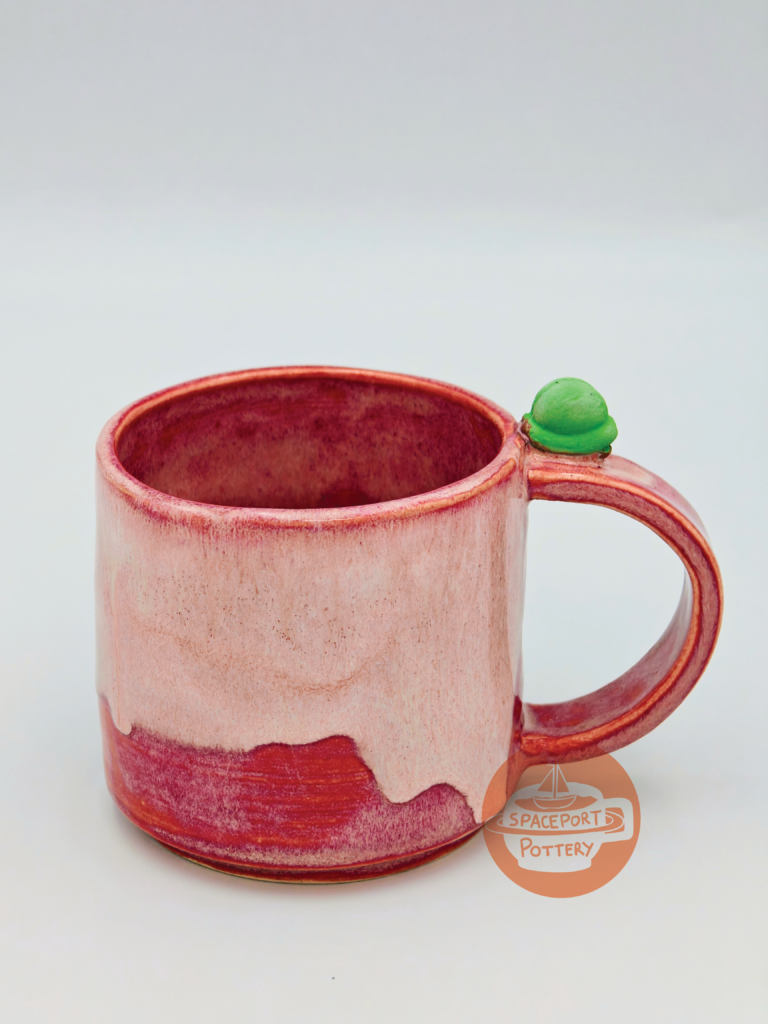 Home In a striking pink glaze, the wheel-thrown stoneware Alien Mug.